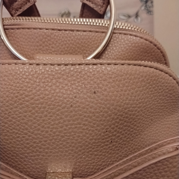 Crossi women's tan bow mini back pack w/ adjustable straps and interior pockets - Picture 5 of 12